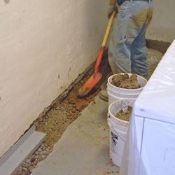 Digging a trench for a French Drain system in Jackson