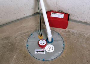 A sump pump system with a battery backup system installed in Hazlehurst