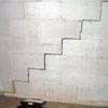 A diagonal stair step crack along the foundation wall of a Lake Charles home