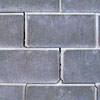 A diagonal stair-step crack found along a foundation wall in a Monroe home