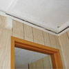 The ceiling and wall separating as the wall sinks with the slab floor in a Lake Charles home