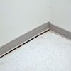A partition wall separating from the floor in a Biloxi home.