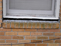 A window sill cracking and separating from the foundation wall in a Houma home.
