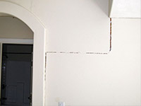 Drywall cracking due to foundation settlement in Monroe