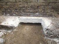 Preparing a foundation footing for helical pier installation in Brandon