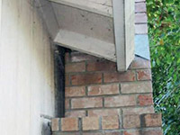 A chimney leaning away from the home on a Slidell foundation