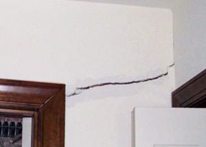 A large drywall crack in an interior wall in Brandon