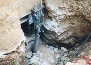 a bent, failed foundation push pier installed in New Orleans.