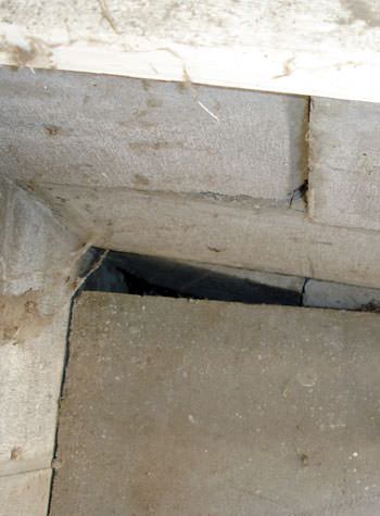 inward rotation of a foundation wall damaged by street creep in a garage in Laurel
