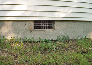 Open crawl space vents that let rodents, termites, and other pests in a home in Greenville
