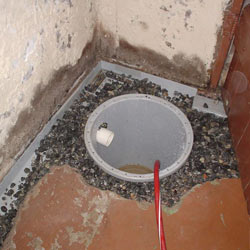 Installing a sump in a sump pump liner in a New Orleans home